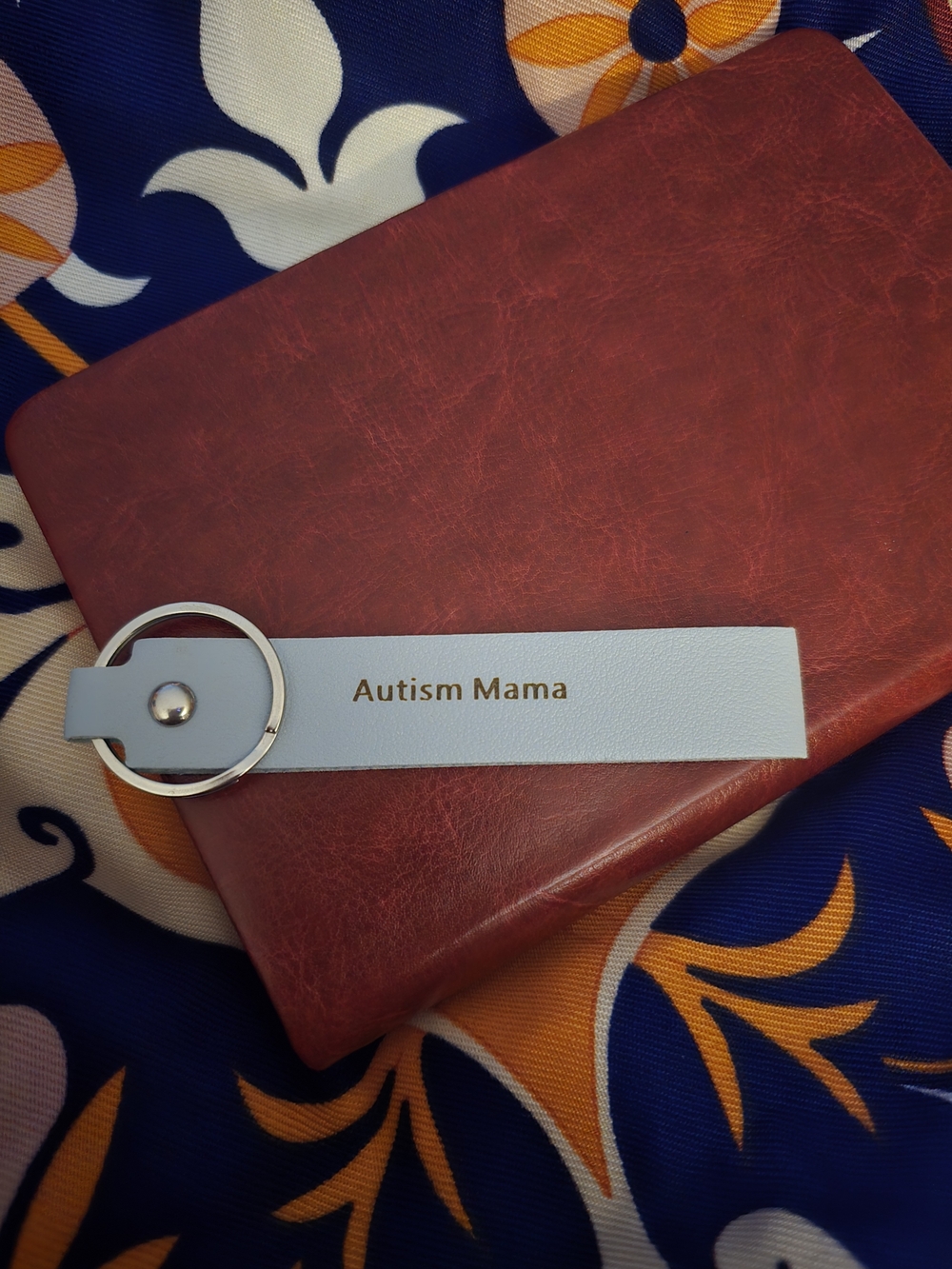 Autism Mama Engraved Light Blue Leather Keychain